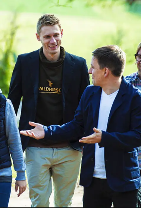 Über mich Mit Geschäftspartner in der ersten Firma